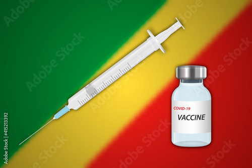 Syringe and vaccine vial on blur background with Congo flag,