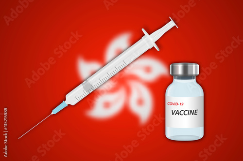 Syringe and vaccine vial on blur background with Hong Kong flag