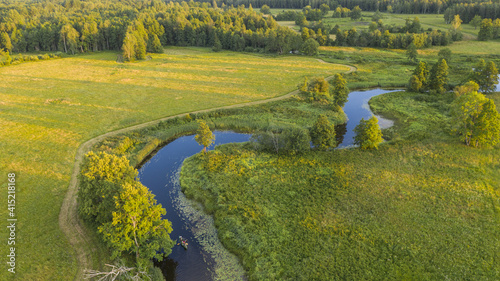 Aerial shot of beautiful Karula National Park full of lakes in Estonia photo