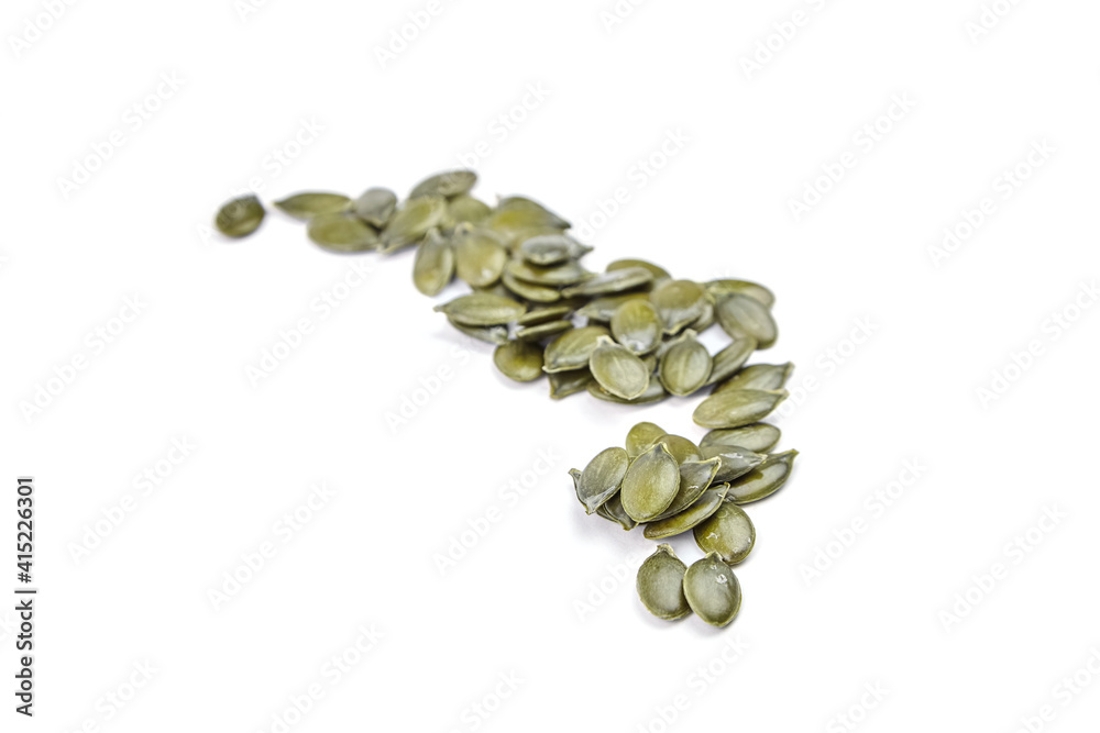 Pumpkin seeds isolated on a white background Pumpkin seeds isolated on a white background