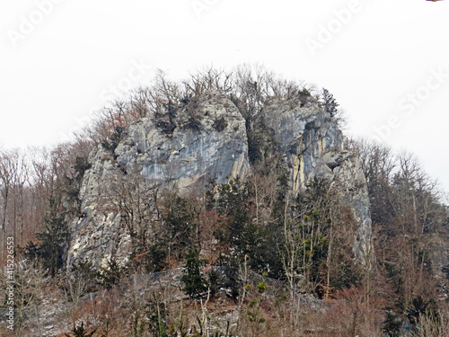 Winter atmosphere on the rocky Chapfenberg hill above Wessen settlement and the subalpine lake Walen or Lake Walenstadt (Walensee) - Canton of St. Gallen, Switzerland (Kanton St. Gallen, Schweiz) photo