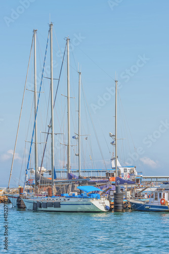 Yacht in harbor of Old Akko, the coastal ancient city of Israel