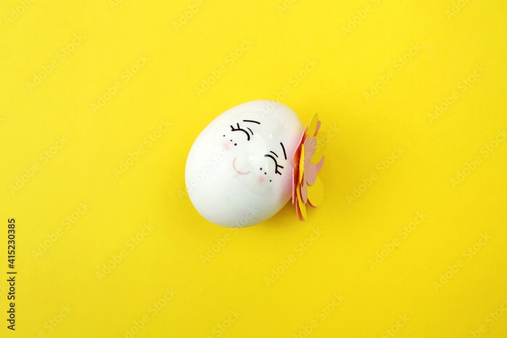 easter egg on a yellow easter egg on a yellow