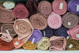 Drapery shop. Fabric rolls in textile store. Small business concept	
