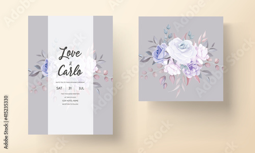 Beautiful wedding invitation card with purple flower ornament