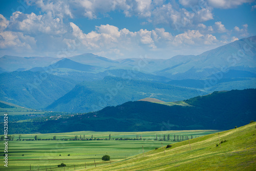Summer landscape with field and mountains, Armenia