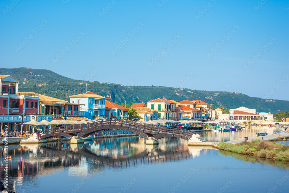 Lefkas (Lefkada) town, amazing view at the small marina for the fishing boats with the nice wooden bridge and promenade, Ionian island, Greece