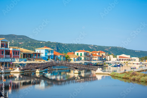 Lefkas (Lefkada) town, amazing view at the small marina for the fishing boats with the nice wooden bridge and promenade, Ionian island, Greece © gatsi
