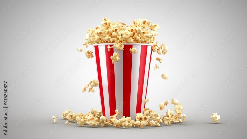 Popcorn falling out of a red-white striped bucket on a white background, nice background (4K,ultra high definition 2160p)
