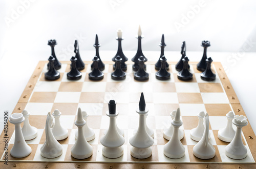 chess piece isolated on white background advising to strategic behavior photo