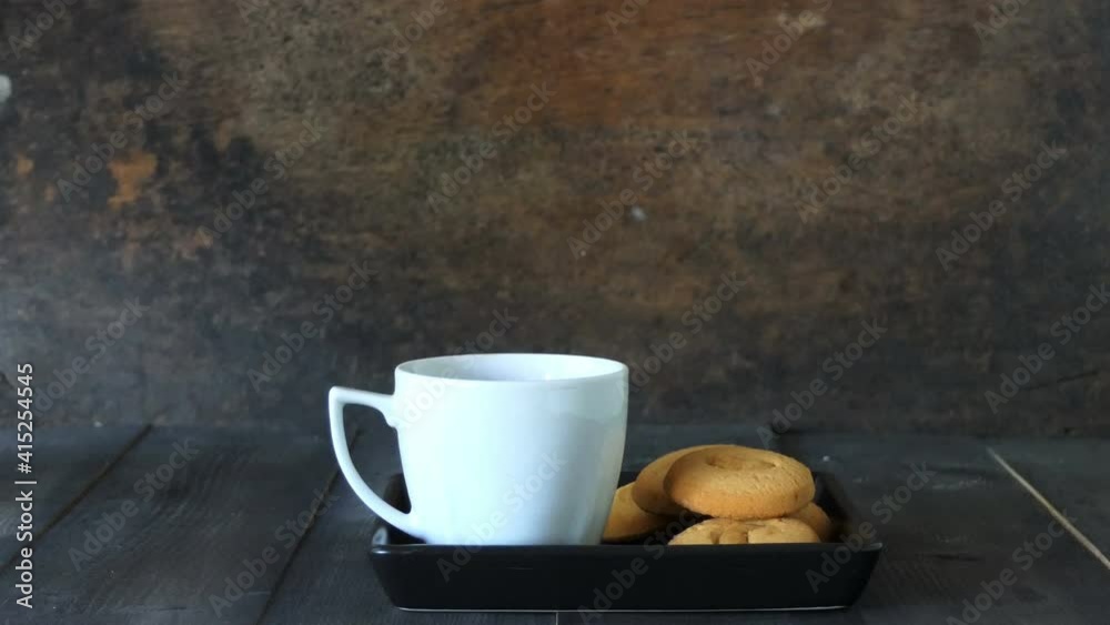 Cup of hot coffee latte on wood table in restaurant Cup of hot coffee latte on wood table in restaurant