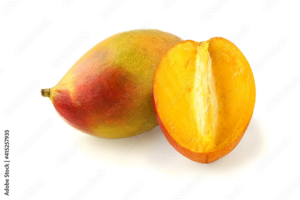 Mango with a half isolated on white Mango with a half isolated on white