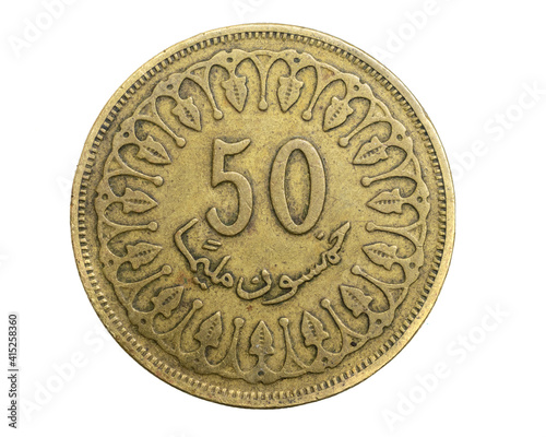 Tunisia fifty milliemes coin on white isolated background photo