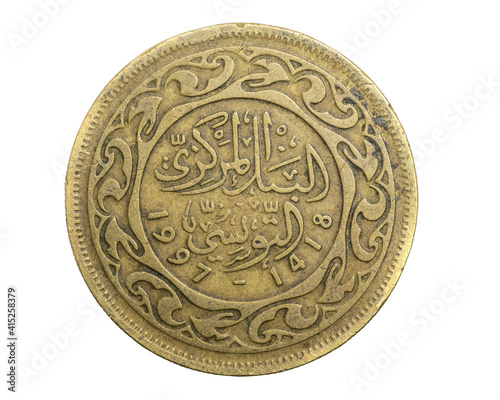 Tunisia fifty milliemes coin on white isolated background photo