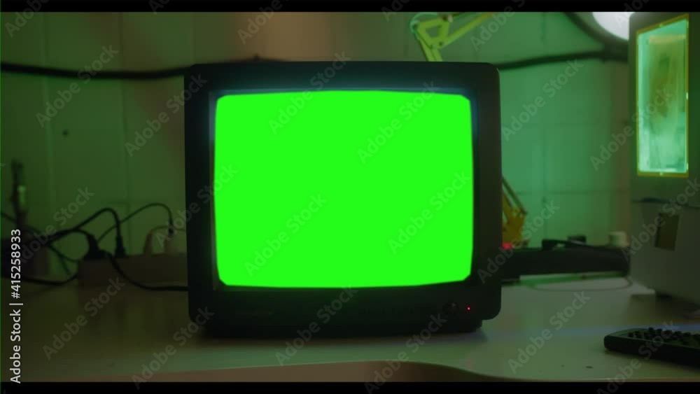 Vintage Television Set Green Background with Noise and Static. Zoom Out. You can replace green screen with the footage or picture you want with “Keying” effect in AE (check tutorials in YouTube).