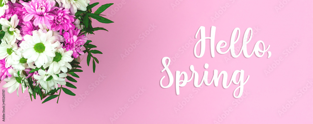 Hello spring flat lay composition with text sign and inscription, bouquet of flowers and banner size