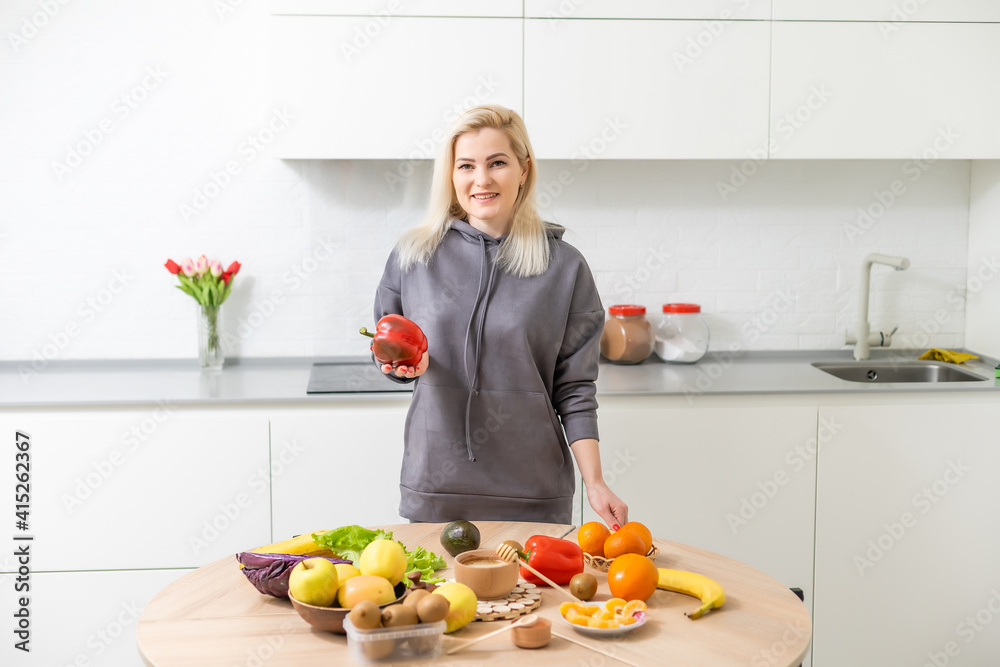 fresh fruits and vegetables on the table in kitchen interior, healthy food concept fresh fruits and vegetables on the table in kitchen interior, healthy food concept