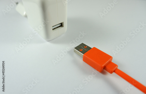 usb charger and cable on a white background close