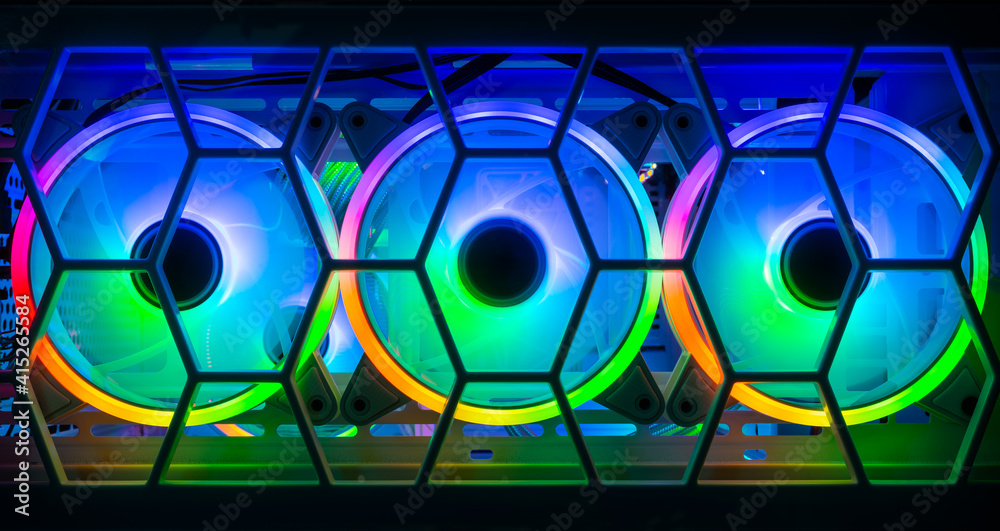 three colorful bright rainbow led rgb pc fan air case cooler white desktop  computer chassis. gaming modding water cooling and technology concept  background Photos | Adobe Stock