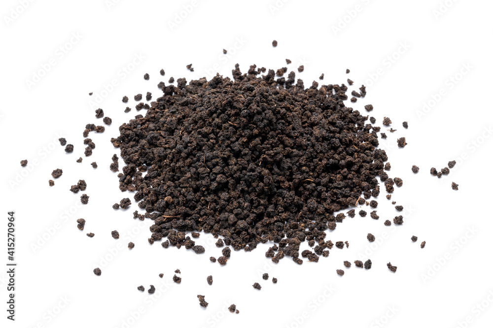 black tea granules isolated on white background. design element. indian beverage tea cut out black tea granules isolated on white background. design element. indian beverage tea cut out