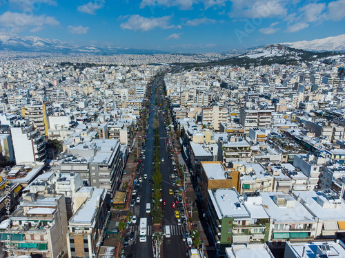 Aerial view of snowy buildings during the Medea snowstorm in Athens, Galatsi