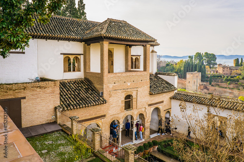 Inside the Generalife palace (part of the Alhambra complex in Granada, Spain), gardens and fountains welcome the visitor. 