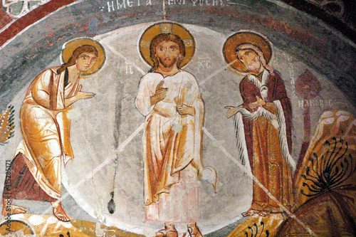 Christian frescoes at cave in Goreme District, Aksaray, Cappadocia, Turkey.
