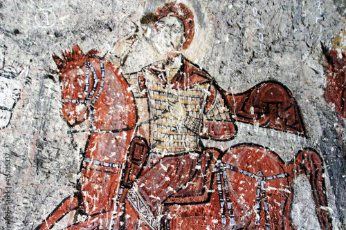 Christian frescoes at cave in Goreme District, Aksaray, Cappadocia, Turkey. photo