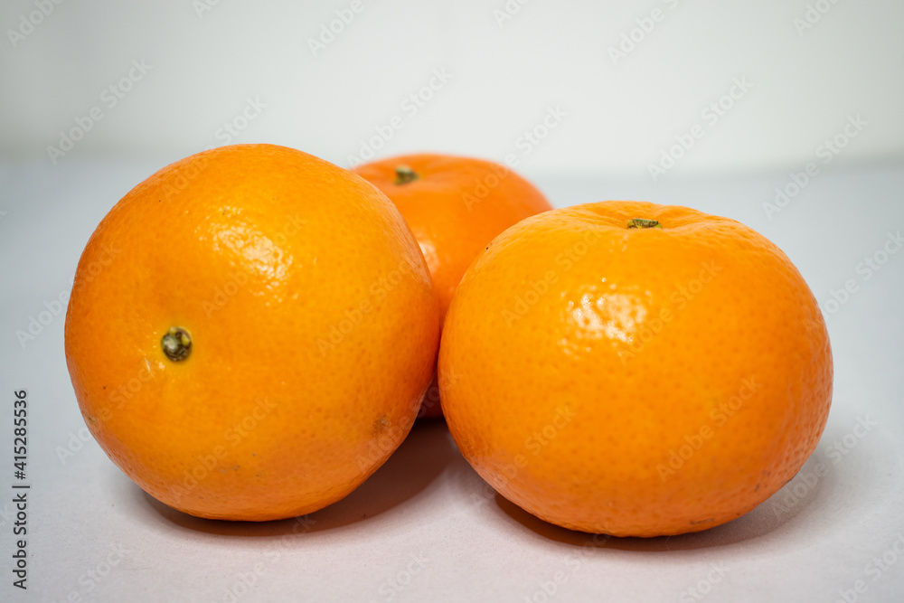 Fresh orange isolated on a white background, Mandarin orange isolated on white background Fresh orange isolated on a white background, Mandarin orange isolated on white background
