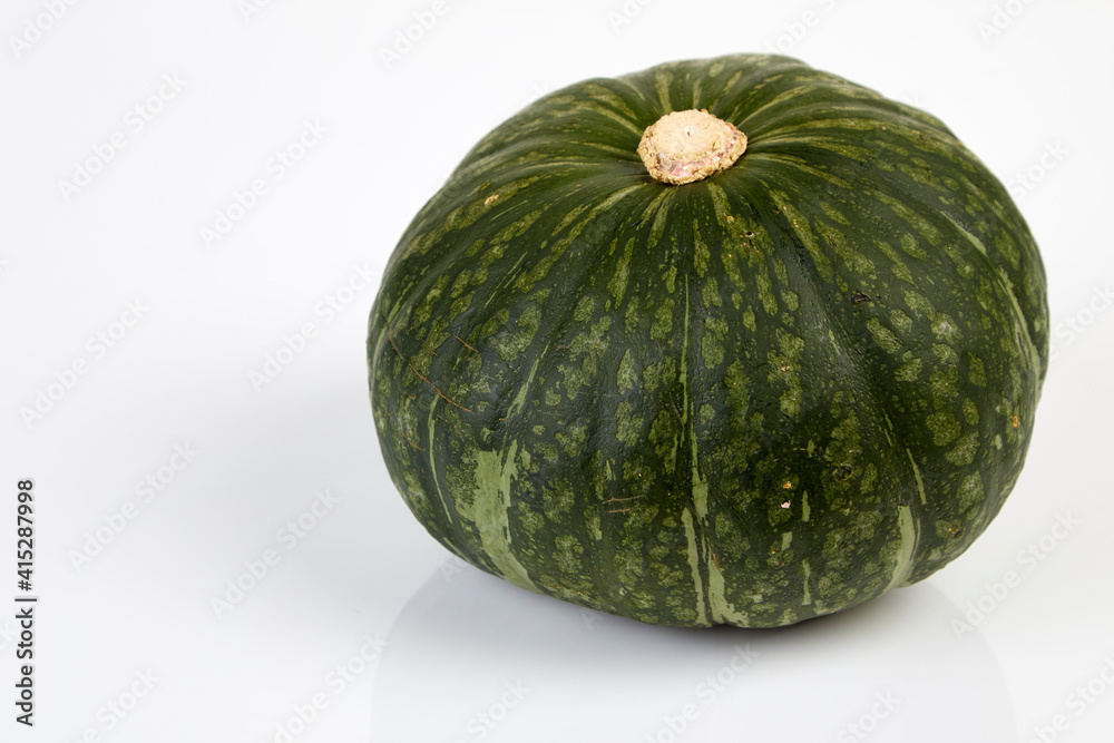 Green pumpkin on the white background Green pumpkin on the white background