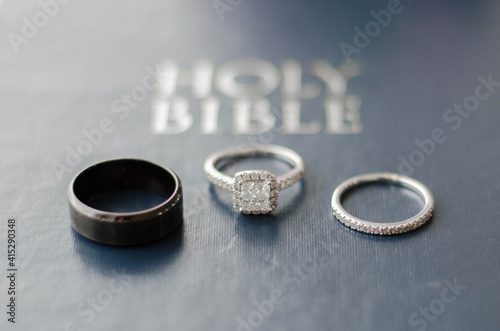 Wedding Rings on top of the Holy Bible