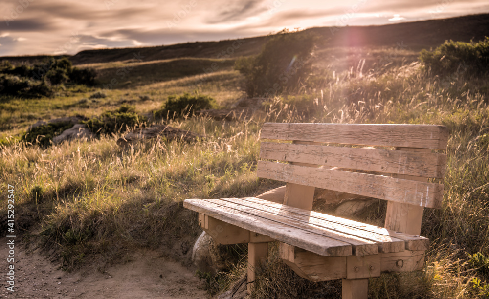 park bench on a grassland trail, Writing-on-Stone Provincial Park, Alberta