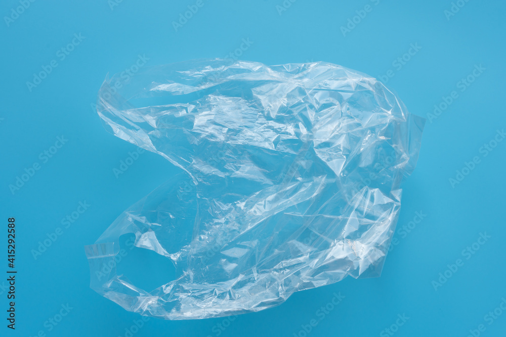 Clear plastic bag on blue background,environment concept.