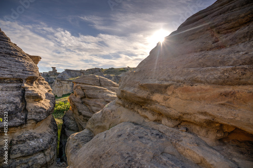 dramatic sunset over hoodoos, Writing-on-Stone Provincial Park, Alberta photo