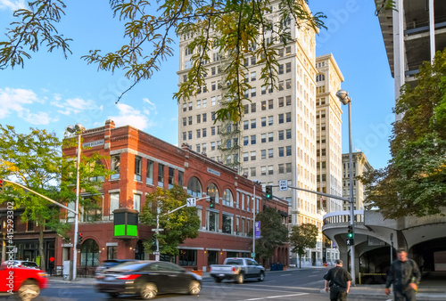 Fototapeta Naklejka Na Ścianę i Meble -  Downtown Main Street in the city center of Spokane, Washington, USA, near the 1889 Red brick building.