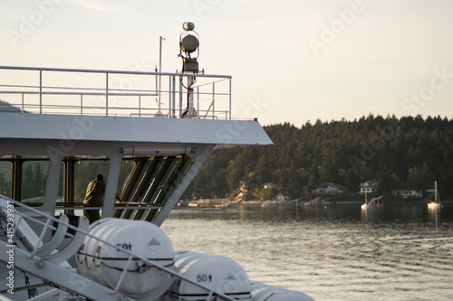 Obraz na plátne crew member looking out from a ferry bridge near the Gulf Islands, BC, Canada