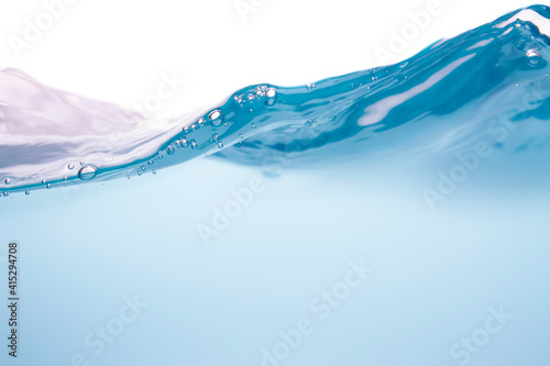Bubbles formed by soft waves of water Air bubbles in the light blue liquid