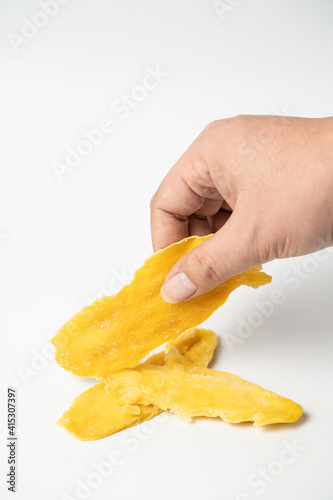 Fruit snack mango dried fruit on pure white background