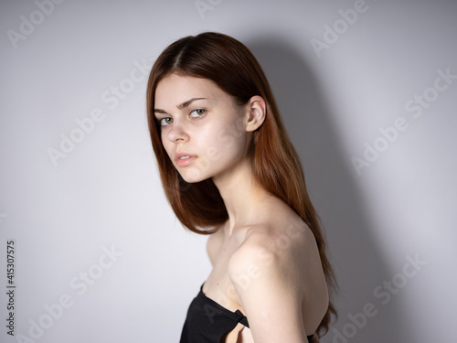 Pretty woman naked shoulders model luxury glamor portrait