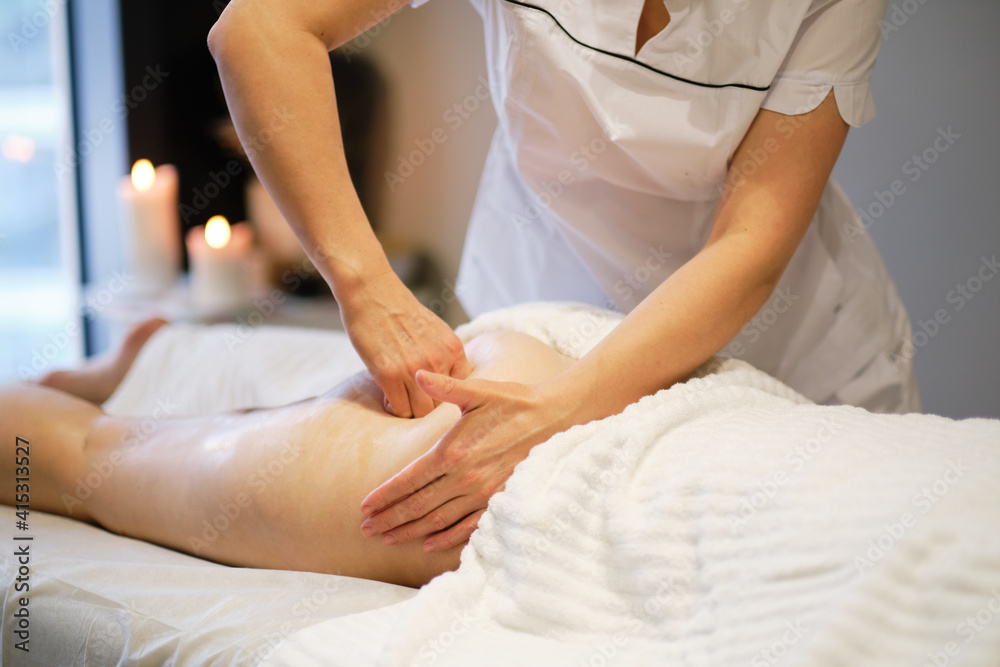 masseur makes anticellulite massage young woman in the spa salon. Body care concept. Special anticellulite treatment. masseur makes anticellulite massage young woman in the spa salon. Body care concept. Special anticellulite treatment.