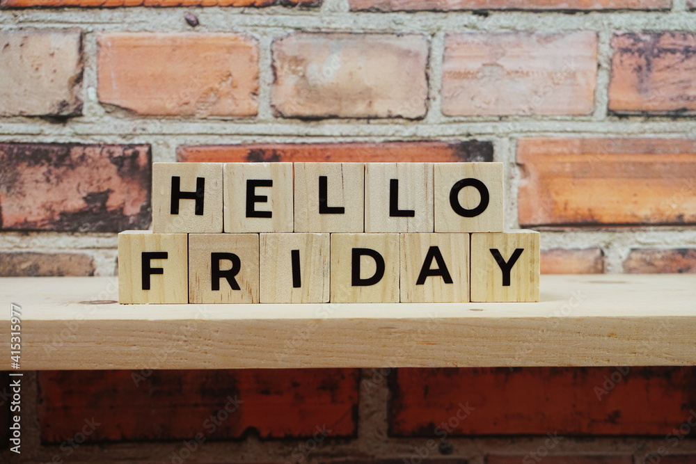 Fototapeta premium Hello Friday alphabet letter on shelves wooden background