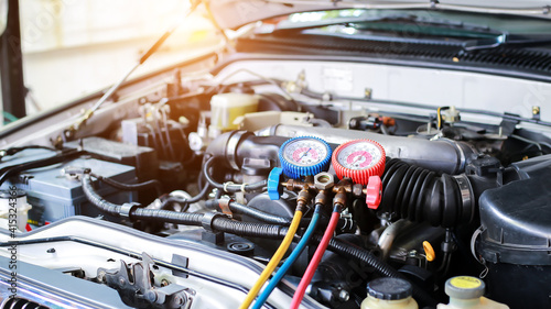 Photos Car air conditioner check service, leak detection, fill refrigerant