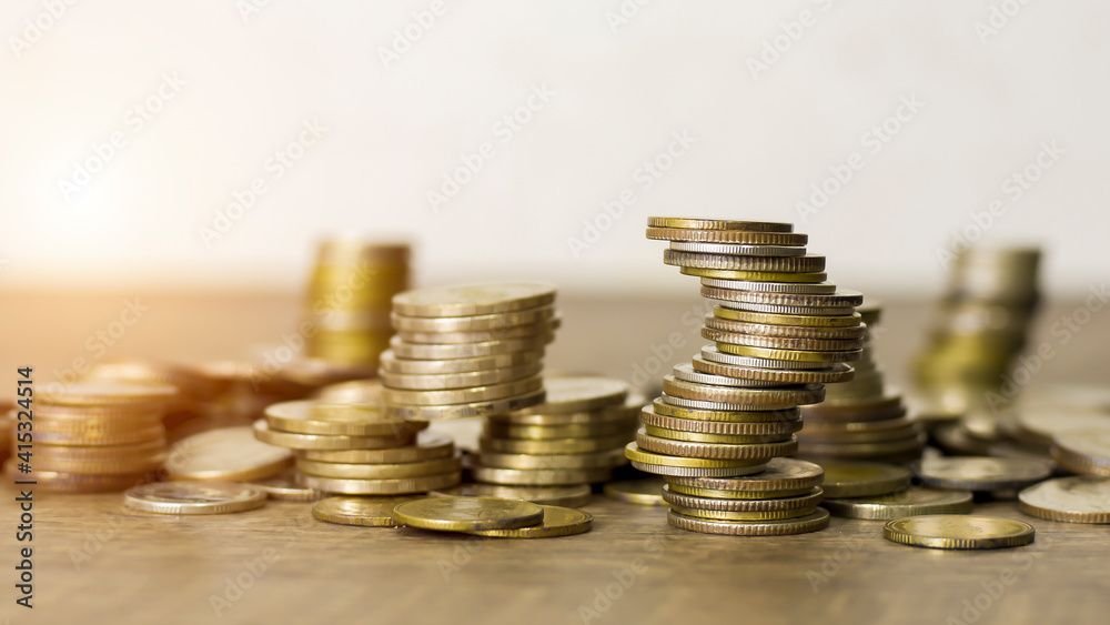 Coins stacked on each other, close up picture, financial aid concept. Coins stacked on each other, close up picture, financial aid concept.