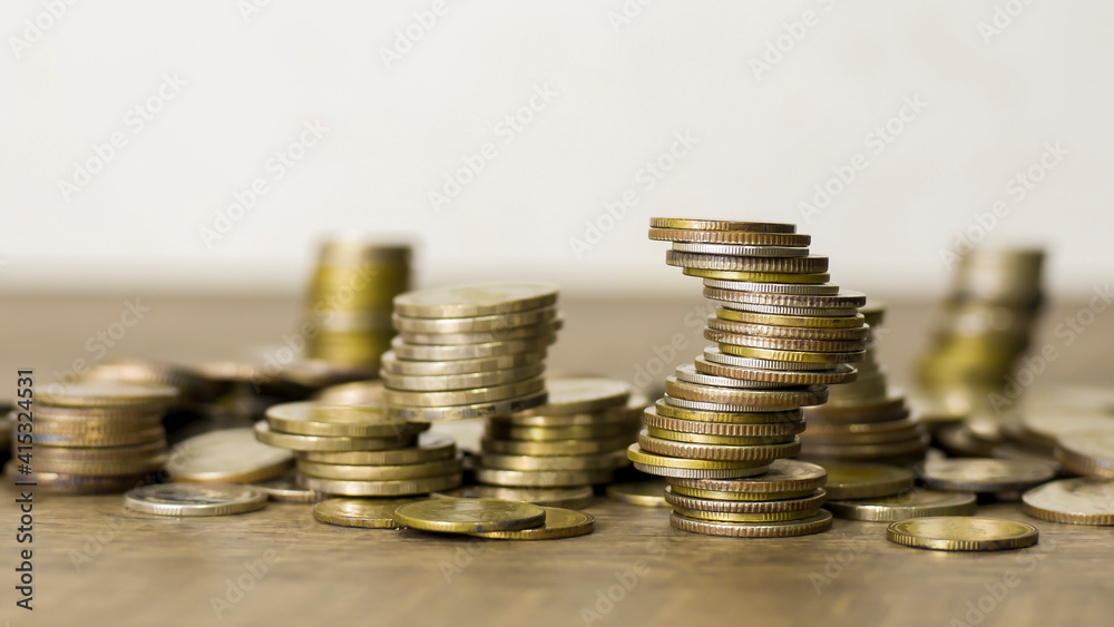 Coins stacked on each other, close up picture, financial aid concept. Coins stacked on each other, close up picture, financial aid concept.
