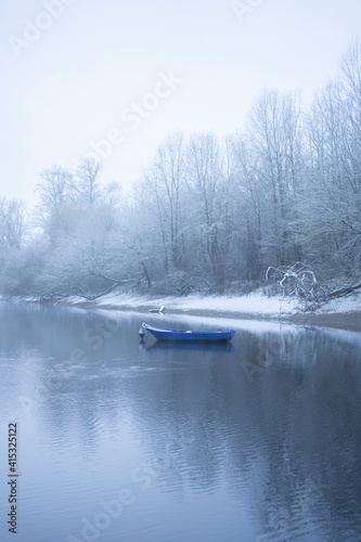 Little Boat in Winter Landscape
