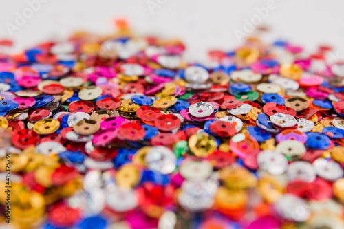 beautiful festive background multicolored with bokeh and sequins
