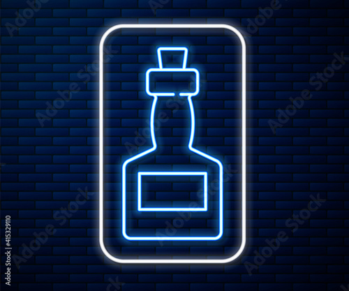 Glowing neon line Tabasco sauce icon isolated on brick wall background. Chili cayenne spicy pepper sauce. Vector.