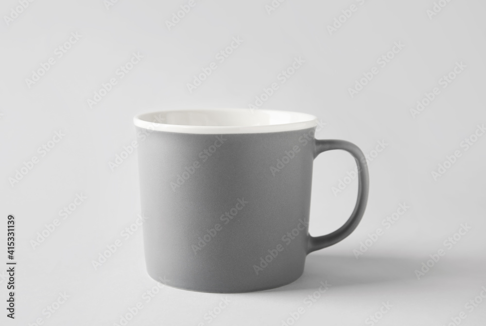 Empty cup on light background Empty cup on light background