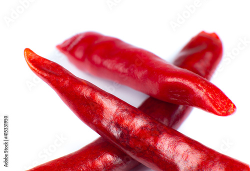 Red hot chili peppers on white background. Close up.