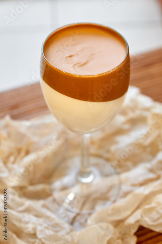 Creamy chocolate dessert in a glass. Close-up, selective focus